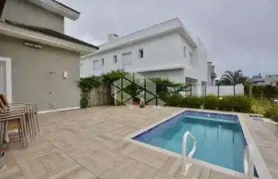 Casa em condomínio fechado com 4 quartos à venda na Rua Rio Novo, 2000, Centro, Xangri-Lá
