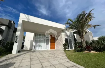 Casa à venda, com 4 quartos/dormitórios, e 2 vagas/box no condomínio enseada, xangri-lá/rs