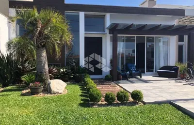 Casa mobiliada de 4 suítes em condomínio fechado em xangri-lá!!