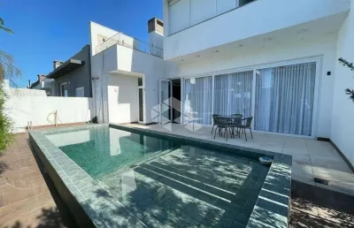 Casa em condomínio à venda no blue, xangri-lá, com 4 suítes, 277m² e alto padrão de acabamento