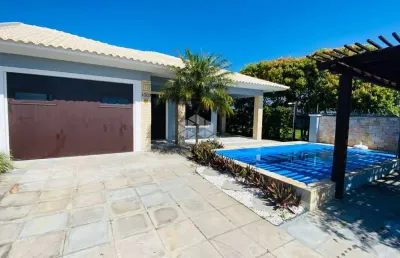 Casa 4 dormitórios, 3 suítes, amplo living,, piscina, varanda, centro - xangri-lá