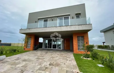 Casa em condomínio fechado à venda no blue, xangri-lá com 4 quartos (4 suítes)