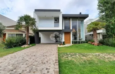 Mansão mobiliada e decorada, 5 suítes, piscina, no condomínio enseada lagos, xangri-lá/rs