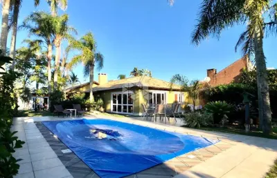 Casa mobiliada com 3 quartos e piscina à venda em atlântida, xangri-lá - 350m²