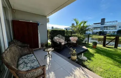 Condomínio rossi xangri-lá 2 dormitórios 1 suíte ,mobiliado e decorado ,beira lago ,todo climatizado ,térreo ,beira lago