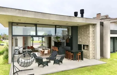 Casa condomínio riviera em xangri-lá, 04 suítes 02 vagas