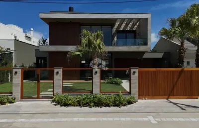 Casa rua guaia das pedras atlântida com 350,00 m²   ,lote com 648 m² ( 18x36) ,05 suítes sendo 02 no térreo  ,lavabo  ,mobilada  ,decorada