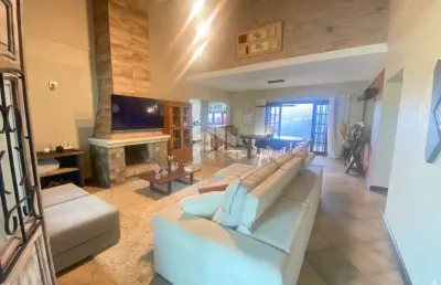 Casa térrea 3 dormitórios, 1 suíte,  mobiliada com piscina, em atlantida