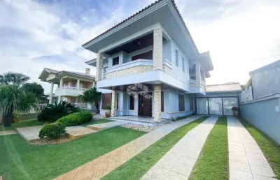 Sobrado à venda, com 4 quartos/dormitórios, 2 vagas/box, em atlântida, xangri-lá/rs