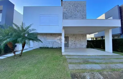 Belissíma casa no condomínio sea coast com vista para o lago, em xangri-lá/rs.