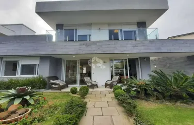Casa com 5 suítes em atlântida, quase divisa com capão da canoa/rs.