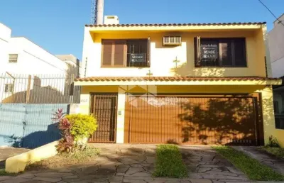 Casa com 3 quartos à venda na Avenida Lageado, 207, Petrópolis, Porto Alegre
