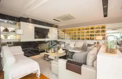 Apartamento semimobiliado com 202m², 3 suítes e 4 vagas no bairro bela vista