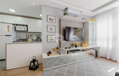 Apartamento semi-mobiliado de 64 m², 2 dormitórios sendo 1 suíte, 1 vaga.