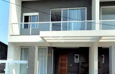 Baixou o preço: casa nova de alto padrão em capão da canoa