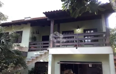 Casa com 5 quartos à venda na Rua Santa Maria, 370, Vila São José, Porto Alegre