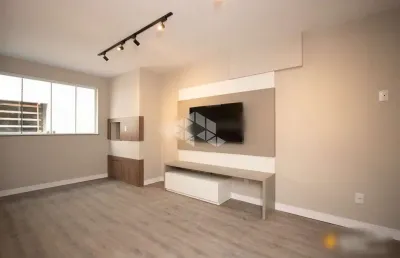 Apartamento com 2 dormitórios,  suíte, living,  churrasqueira.