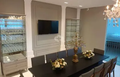 Apartamento mobiliado com três quartos em meia praia itapema sc