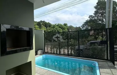 Casa sobrado três quartos  com piscina em mariscal bombinhas sc