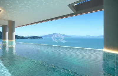 Cobertura frente mar com três suítes em canto grande bombinhas sc