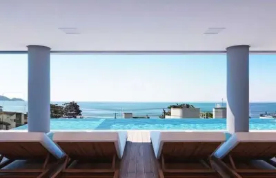 Apartamento com duas suites e vista mar em bombas sc