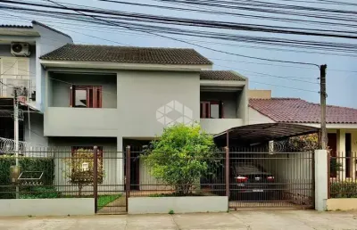 Casa com 3 quartos à venda na Rua Radialista Fredy Germano, 376, Juscelino Kubitschek, Santa Maria