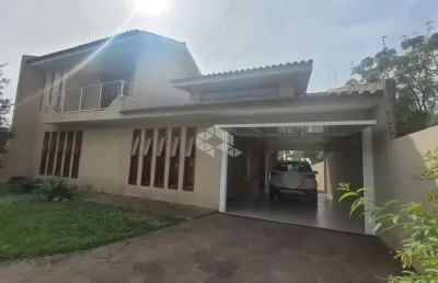 Casa com 4 quartos e 2 suítes com espaço gourmet no bairro camobi em santa maria