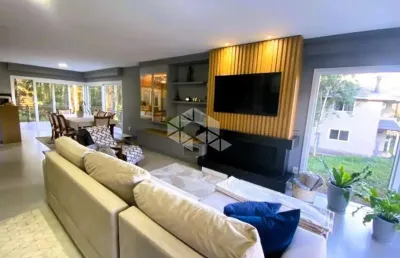 Casa com 3 suítes no vivendas do arvoredo em gramado