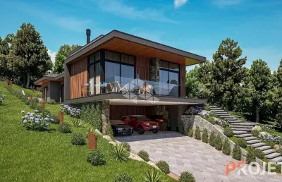 Casa em gramado com 3 dormitórios sendo 1 suíte à poucos minutos do centro