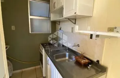 Apartamento 2 dormitórios, mobiliado, 1 banheiro, 1 vaga.