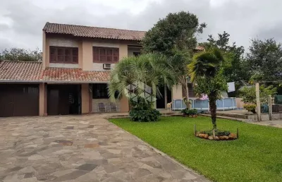 Casa com 4 quartos à venda na Rua Ney Brito, 140, Nossa Senhora das Graças, Canoas
