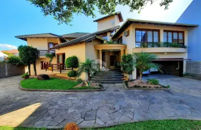 Casa com 6 quartos à venda na Rua das Hortênsias, 129, Igara, Canoas
