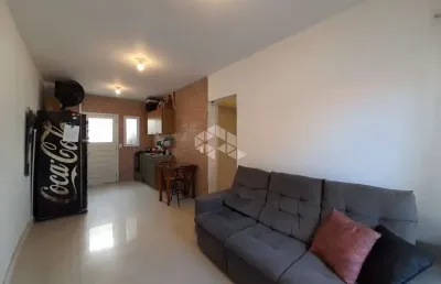 Casa em condomínio fechado com 2 dormitórios  e vaga