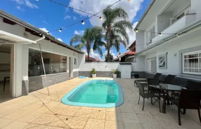 Sobrado de 4 dormitórios, 1 no térreo, piscina, 4 vagas, no bairro bela vista em canoas!