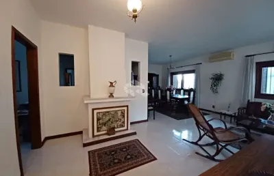 Casa com 3 suítes e 197 privativos no bairro marechal rondon/ canoas.