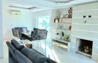 Casa com 5 quartos sendo os 4 suítes, closet, 2 hidro, pátio com piscina, área goumet com churrasqueira. à venda no bairro são josé/canoas. financia