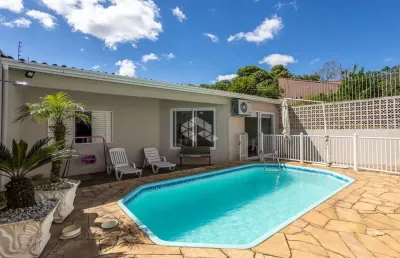 Casa térrea à venda no bairro estância velha em canoas com piscina, edícula e energia solar - aceita financiamento e fgts