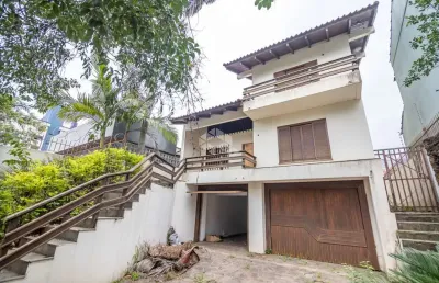 Sobrado comercial ou residencial, 3 dormitórios, sendo 1 suíte com closet e hidro, área intima com lareira. à venda no bairro marechal rondon/canoas
