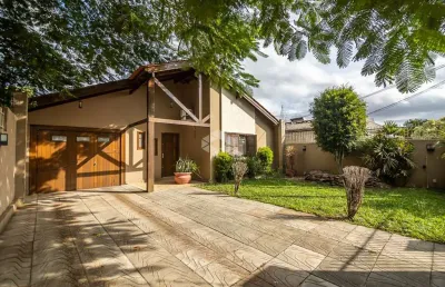 Casa 3 dormitórios sendo 1 suíte, 4 vagas,  lareira, pátio, piscina, à venda no bairro nossa senhora das graças, canoas. aceita financiamento fgts