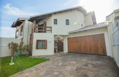 Casa/sobrado com 228m² 3 dormitórios, 1 suite, sacada, hidro, espaço gourmet e 4 vagas de garagem a venda no bairro bela vista/canoas!