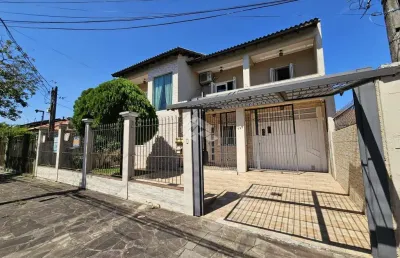 Casa 4 dormitórios com 2 suítes, hidromassagem, pátio com piscina, sala de estar e jantar. a venda no bairro bela vista- canoas