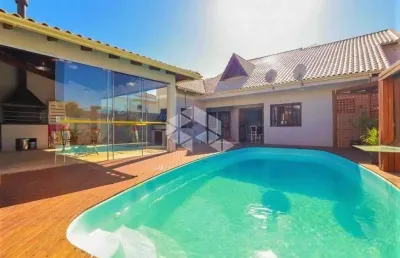 Casa 4 dormitórios, 3 suítes, 4 vagas, piscina e amplo pátio