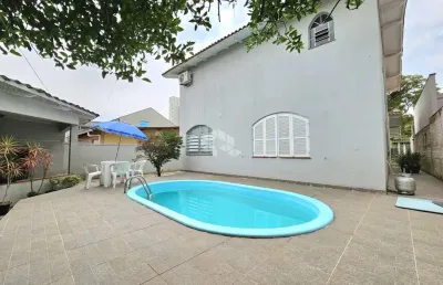 Casa sobrado 4 dormitórios, suíte, 2 banheiros sociais, sacada, piscina, churrasqueira, 5 vagas. localizado no bairro marechal rondon