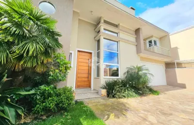 Casa sobrado com 3 quartos sendo 1 suíte master e 4 vagas no bairro igara em canoas rs