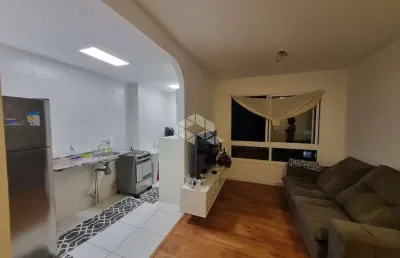 Apartamento mobiliado com 61m², 2 dormitórios sendo 1 suíte, cozinha com churrasqueira e lavanderia,  1 vaga de garagem,  ao lado da havan