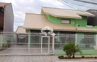 Casa sobrado, igara/canoas, 03 dormitórios, 3 vaga garagem, semi mobiliado com lareira, aceita financiamento e fgts. próximo park shopping.
