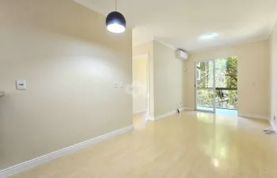 Apartamento com 2 dormitórios/quartos , living para 2 ambientes e uma sacada com churrasqueira, 1 vaga de garagem coberta no bairro marechal rondon