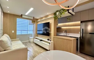 Apartamento 2 dormitórios, sala, mobiliado, cozinha americana, 1 vaga, elevador, piscina, escritório, sacada com churrasqueira. no bairro vila rosa