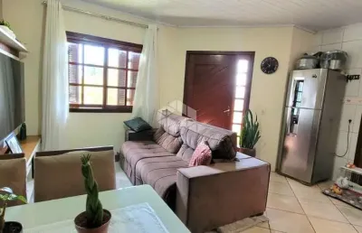 Casa à venda no bairro olaria em canoas - 2 dormitórios, 3 vagas, com financiamento e uso de fgts