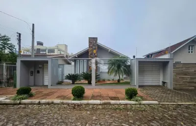 Casa moderna, ampla, com 3 suítes, área gourmet completa, piscina e 4 vagas cobertas no bairro rio branco - novo hamburgo.